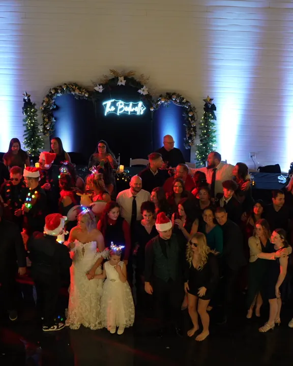 A packed dance floor at a winter reception